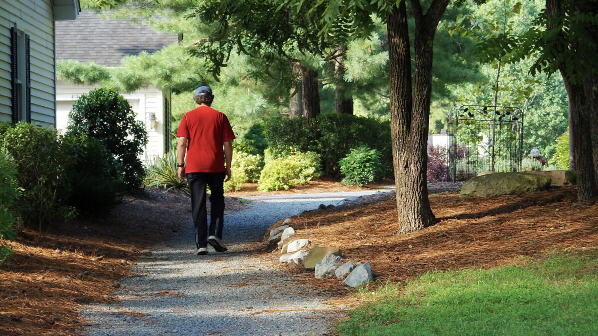 Photo showing a person walking a path at Countryhouse